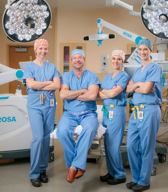 Ian Weber, MD, and his clinic team at the Centura Joint Replacement Center, St. Anthony North Hospital